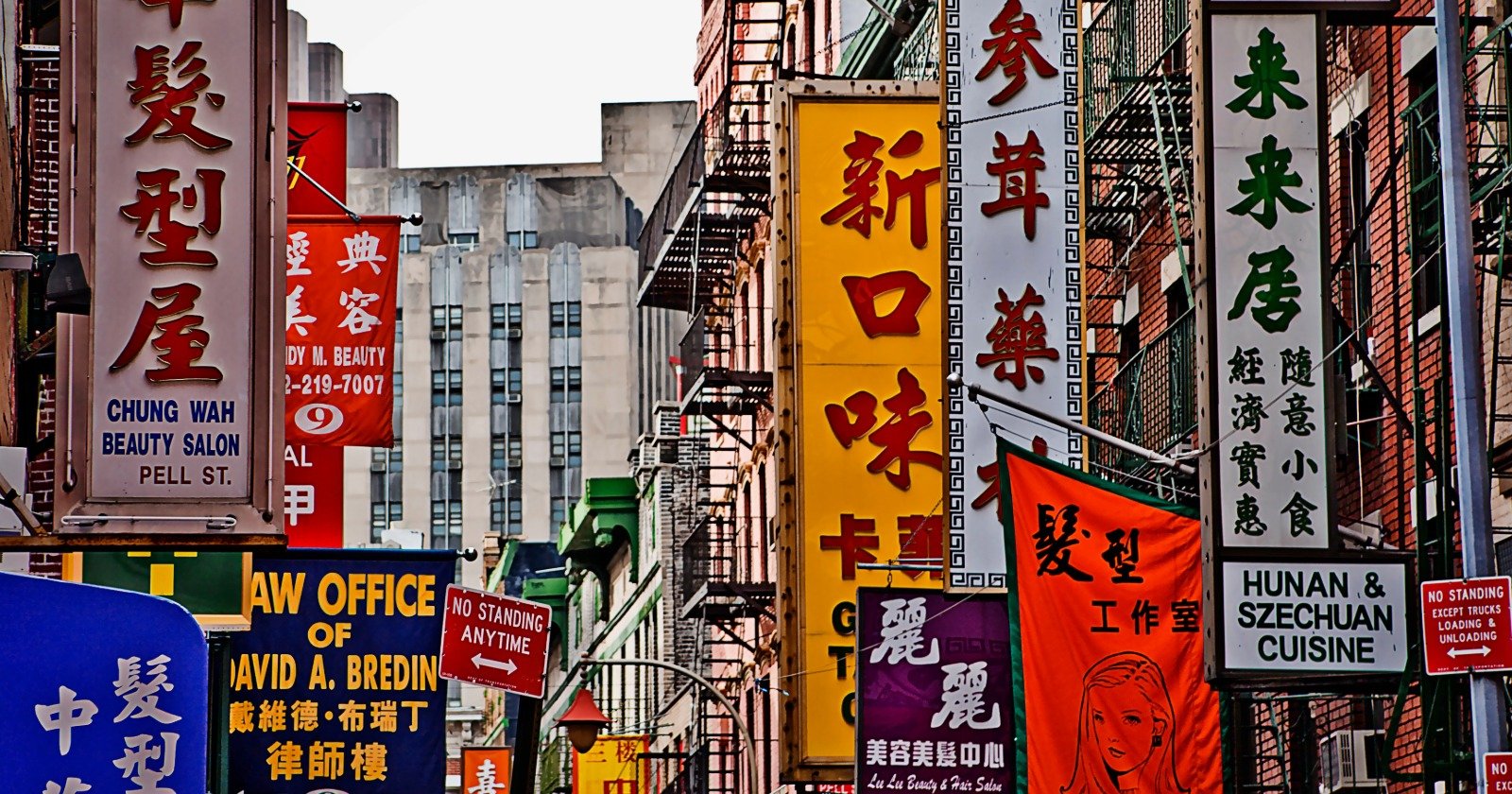 Immigrant neighborhoods are still cheaper than their cities, but the gap is shrinking
